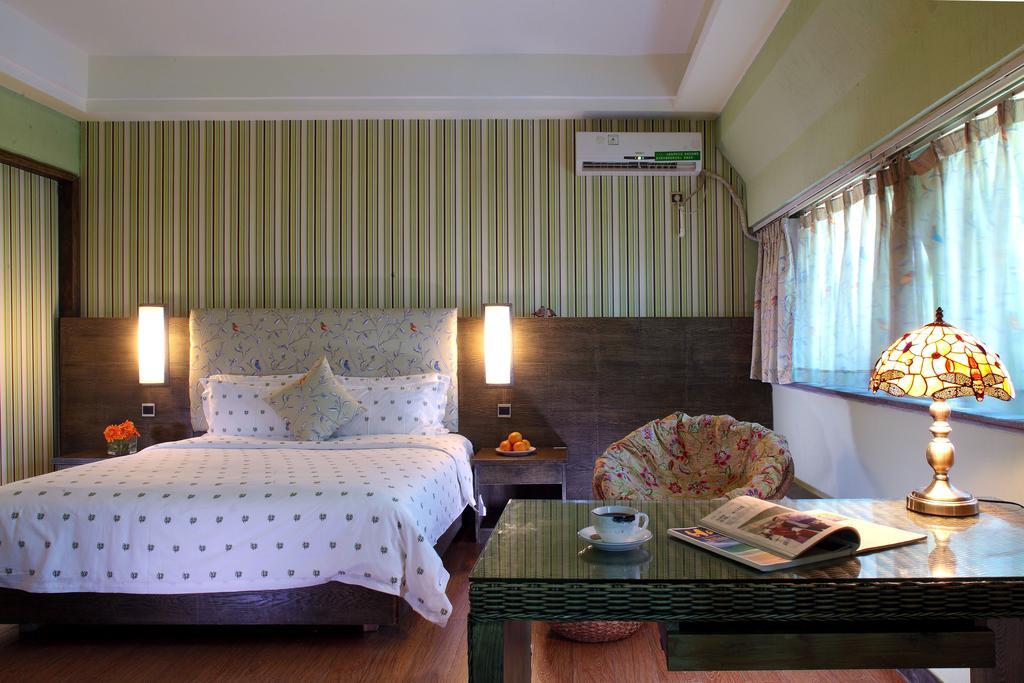 Forest City Resort Hotel Haikou  Habitación foto