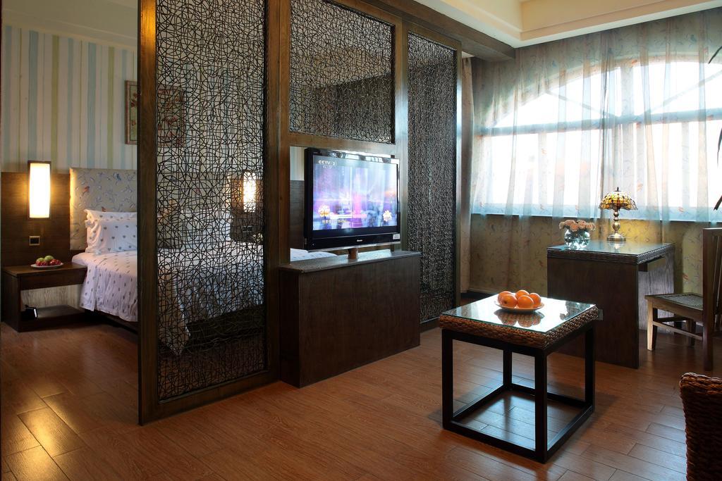 Forest City Resort Hotel Haikou  Habitación foto